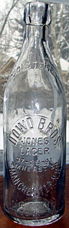 DOWD BROTHERS JONES LAGER EMBOSSED BEER BOTTLE