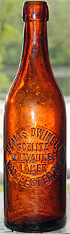 DEMAS DWINELL SCHLITZ MILWAUKEE LAGER EMBOSSED BEER BOTTLE