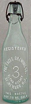 THE EAGLE BREWING COMPANY EMBOSSED BEER BOTTLE