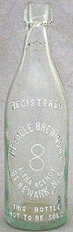 THE EAGLE BREWING COMPANY EMBOSSED BEER BOTTLE