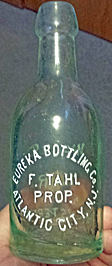 EUREKA BOTTLING COMPANY WEISS BIER EMBOSSED BEER BOTTLE