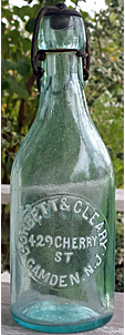 CORBETT & GLEASON WEISS BEER EMBOSSED BEER BOTTLE