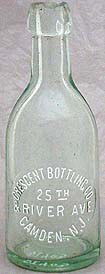 CRESCENT BOTTLING COMPANY WEISS BIER EMBOSSED BEER BOTTLE