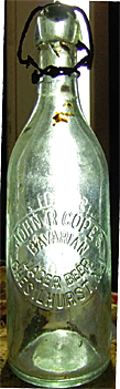 JOHN R. COPES BAVARIAN LAGER BEER EMBOSSED BEER BOTTLE