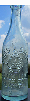 CHARLES A. DAVIS PHILADA LAGER EMBOSSED BEER BOTTLE