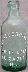 CLAUSS BROTHERS WHITE BEER EMBOSSED BEER BOTTLE