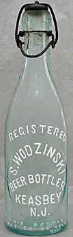 S. WODZINSKI BEER BOTTLER EMBOSSED BEER BOTTLE