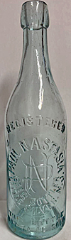 PAUL NASTASIA BEER BOTTLER EMBOSSED BEER BOTTLE