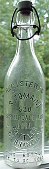 S. TOMAINI BEER BOTTLER EMBOSSED BEER BOTTLE