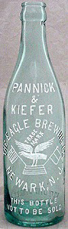 THE EAGLE BREWING COMPANY EMBOSSED BEER BOTTLE