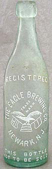 THE EAGLE BREWING COMPANY EMBOSSED BEER BOTTLE