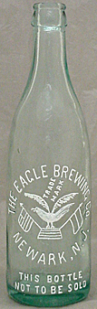 THE EAGLE BREWING COMPANY EMBOSSED BEER BOTTLE