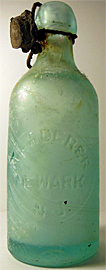 M. LAUDERER WEISS BEER EMBOSSED BEER BOTTLE