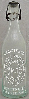 THE EAGLE BREWING COMPANY EMBOSSED BEER BOTTLE