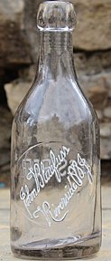 JOHN BLAUFUSS WEISS BEER EMBOSSED BEER BOTTLE