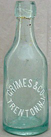 GRIMES & COMPANY WEISS BEER EMBOSSED BEER BOTTLE