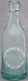 SCHROTH REEDER COMPANY WEISS BEER EMBOSSED BEER BOTTLE