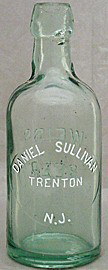 DANIEL SULLIVAN WEISS BEER EMBOSSED BEER BOTTLE