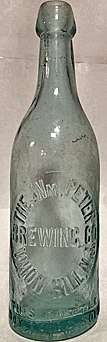 THE WILLIAM PETER BREWING COMPANY EMBOSSED BEER BOTTLE