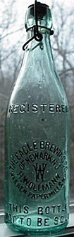 THE EAGLE BREWING COMPANY OF NEWARK, N.J. EMBOSSED BEER BOTTLE