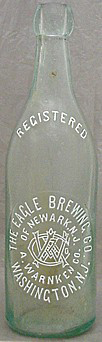 THE EAGLE BREWING COMPANY EMBOSSED BEER BOTTLE