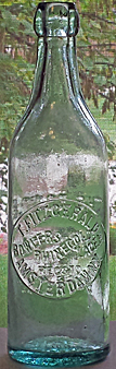 BOWLERS RHIENGOLD LAGER EMBOSSED BEER BOTTLE