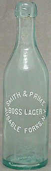 SMITH & PRIME BOSS LAGER EMBOSSED BEER BOTTLE