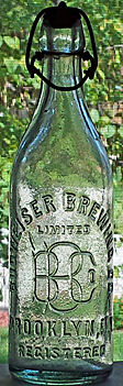 BUDWEISER BREWING COMPANY LIMITED EMBOSSED BEER BOTTLE