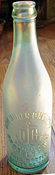 OTTO HUBER BREWERY EMBOSSED BEER BOTTLE