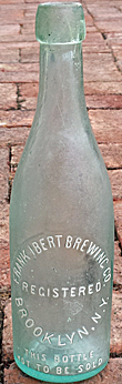 FRANK IBERT BREWING COMPANY EMBOSSED BEER BOTTLE