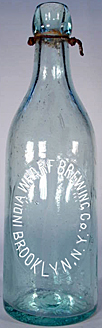 INDIA WHARF BREWING COMPANY EMBOSSED BEER BOTTLE