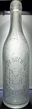 MALCOM BREWING COMPANY EMBOSSED BEER BOTTLE