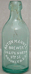 ANTON MANNEL BREWER EMBOSSED BEER BOTTLE