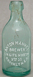 ANTON MANNEL BREWER EMBOSSED BEER BOTTLE