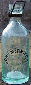 JOHN MENNINGER WEISS BEER EMBOSSED BEER BOTTLE