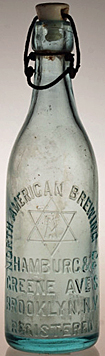 NORTH AMERICAN BREWING COMPANY EMBOSSED BEER BOTTLE