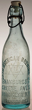 NORTH AMERICAN BREWING COMPANY EMBOSSED BEER BOTTLE