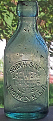 NORTH SIDE BREWERY EMBOSSED BEER BOTTLE