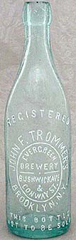 JOHN F. TROMMER EVERGREEN BREWERY EMBOSSED BEER BOTTLE