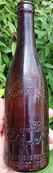 JOHN F. TROMMER EVERGREEN BREWERY EMBOSSED BEER BOTTLE