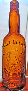 EAGLE BEER COMPANY EMBOSSED BEER BOTTLE