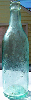 EAGLE BEER COMPANY EMBOSSED BEER BOTTLE