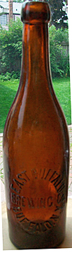 EAST BUFFALO BREWING COMPANY EMBOSSED BEER BOTTLE