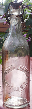 GAMBRINUS BREWING COMPANY EMBOSSED BEER BOTTLE