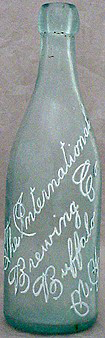 THE INTERNATIONAL BREWING COMPANY EMBOSSED BEER BOTTLE