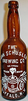 THE JOHN SCHUSLER BREWING COMPANY EMBOSSED BEER BOTTLE