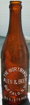 THE WORTMAN COMPANY ALES & BEER EMBOSSED BEER BOTTLE