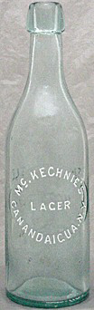 McKECHNIE'S LAGER EMBOSSED BEER BOTTLE