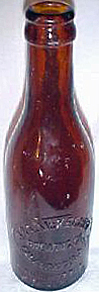 J. & A. McKECHNIE BREWING COMPANY EMBOSSED BEER BOTTLE