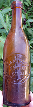 J. & A. McKECHNIE BREWING COMPANY EMBOSSED BEER BOTTLE